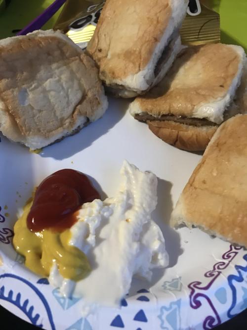 Microwave White Castle cheeseburgers with condiments for dipping on a paper plate Make sure to follo