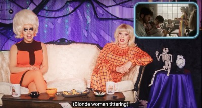Drag queens Trixie and Katya in orange outfits sit on a couch on a Halloween-themed Netflix set. Superimposed in the corner is a clip from Brand New Cherry Flavor. The caption reads: Blonde women tittering