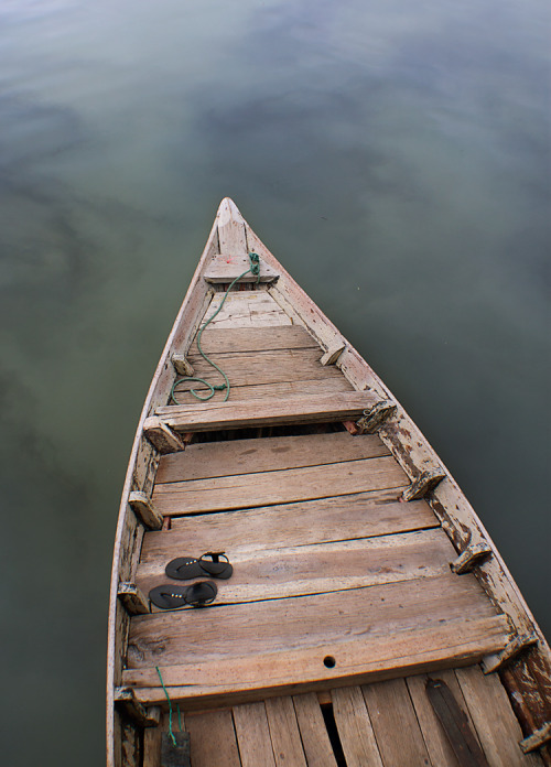 svetlanatomova:  As seen under the Cầu An Hội bridge in   Hội An, Vietnam.  I so want this boat. =3