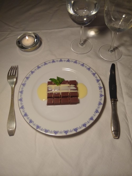 Tonight's Course Is A KitKat, Cooked Medium Rare And Topped With A Vanilla Custard Sauce. Garnished With