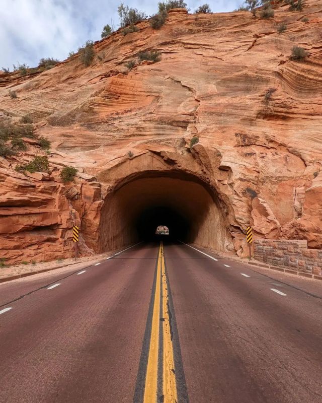 Tunnel through the rock in Zion National Park. * Credit 👉🏆📷 @roy.coffee83 * * Follow 👉 🇺🇸@conexao.america for more photos and movies about United States 🇺🇸  . . Alliance @america_states @enjoy_la_ @americafortwo  . . . #conexaoamerica  #zionnationalpark #utahunique #utahlife #utahphotography #utahphotographer #utahisrad #slc #weliveelevated #werutah #utahisbeautiful #visitutah #utahillustrated #nationalparkgeek #national_park_photography #goparks #nationalparkspartnership #usaroadtrip #roadtripusa #divine_deserts #westbysouthwest #teampixel #roadsideamerica #adventurenthusiasts #worldmobilephotography #az #hikingbangers #thegreatoutdoors #exploretheglobe #southwest  (em Zion National Park) https://www.instagram.com/p/CcN_qLMrh0M/?igshid=NGJjMDIxMWI= #conexaoamerica#zionnationalpark#utahunique#utahlife#utahphotography#utahphotographer#utahisrad#slc#weliveelevated#werutah#utahisbeautiful#visitutah#utahillustrated#nationalparkgeek#national_park_photography#goparks#nationalparkspartnership#usaroadtrip#roadtripusa#divine_deserts#westbysouthwest#teampixel#roadsideamerica#adventurenthusiasts#worldmobilephotography#az#hikingbangers#thegreatoutdoors#exploretheglobe#southwest