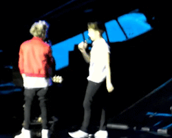   Louis interrupting Niall’s speech to give him a really long hug »  