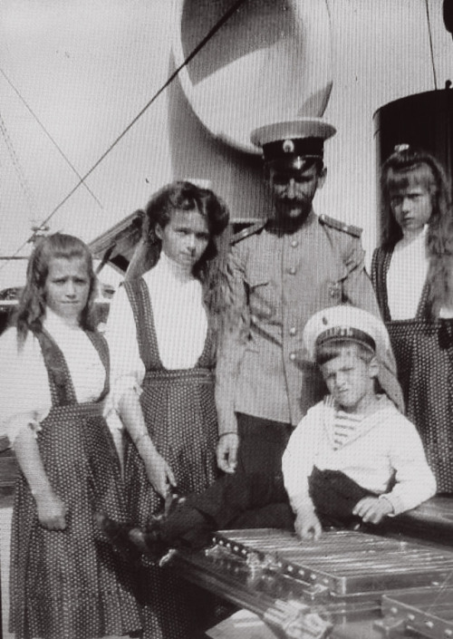imperial-russia:Tsesarevich Alexei and his elder sisters Olga, Maria and Anastasia photographed on b