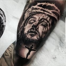 dubuddha-tattoo:    jesus on bicep by Benji