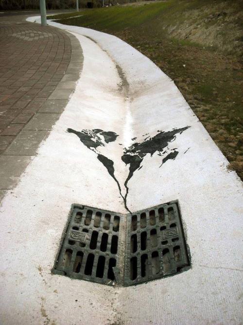 Going down the drain (street art by Pejac) adult photos