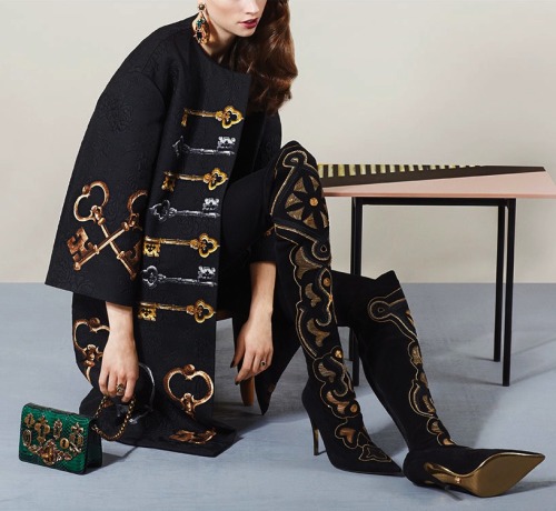 fashion-boots: Leggings, $790, coat, dress and bag, all Dolce &amp; Gabbana. Boots by Versace. P