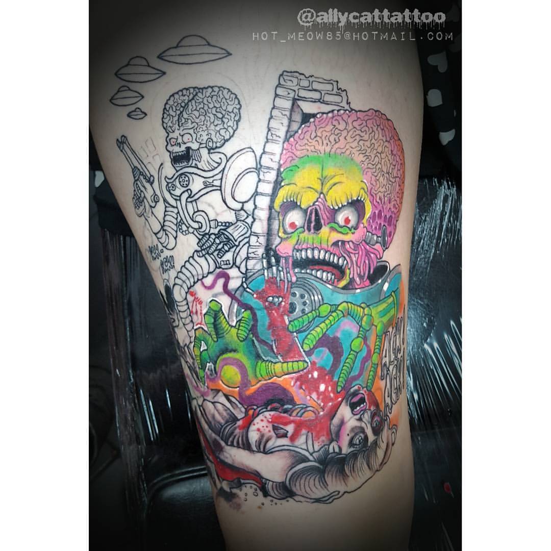 Mars Attacks inspired tattoo on the left thigh