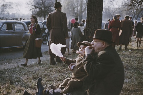 vintageeveryday: A man and a boy sharing candyfloss at an Easter Fair held on Hampstead Heath, Londo