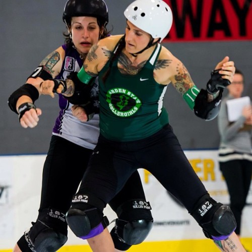 Beav laying a hit on the Charlotte jammer! Photo: quickdrawphoto.com #northarlington #rollerderby #d