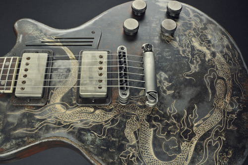 glorifiedguitars:  James Trussart Rust On Cream Dragon Engraved SteelDeville