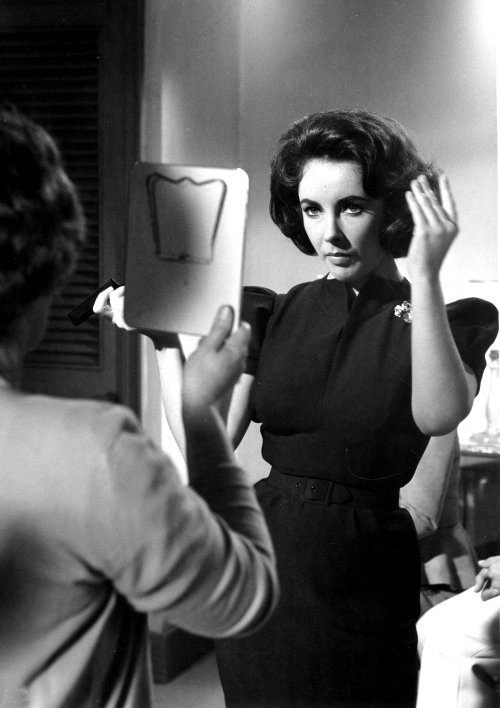 misselizabethtaylor:
“ Elizabeth Taylor checks her hair on the set of Suddenly, Last Summer, 1959.
”