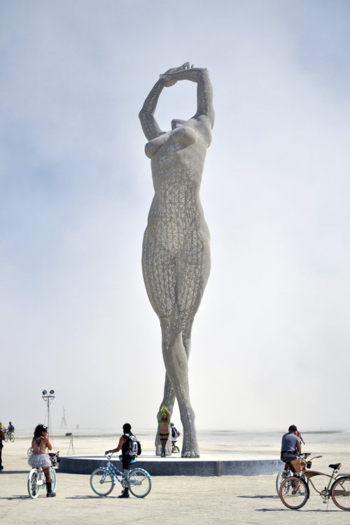 asylum-art:    Truth is Beauty by Marco Cochrane  One of the most eye-catching artworks at this year’s Burning Man festival was a 55-feet tall sculpture of a woman in a beautifully elegant pose. Truth is Beauty is the second of three sculptures in a