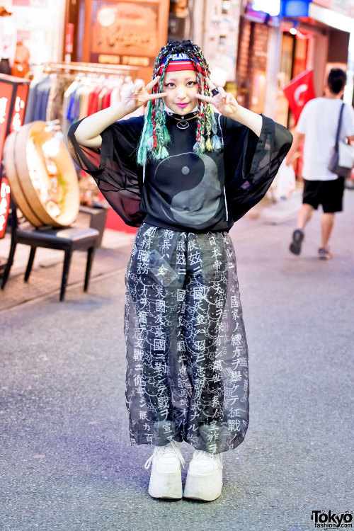 19-year-old Juria on the street in Harajuku wearing a sheer Yaponskii top, layered Buccal Cone and H