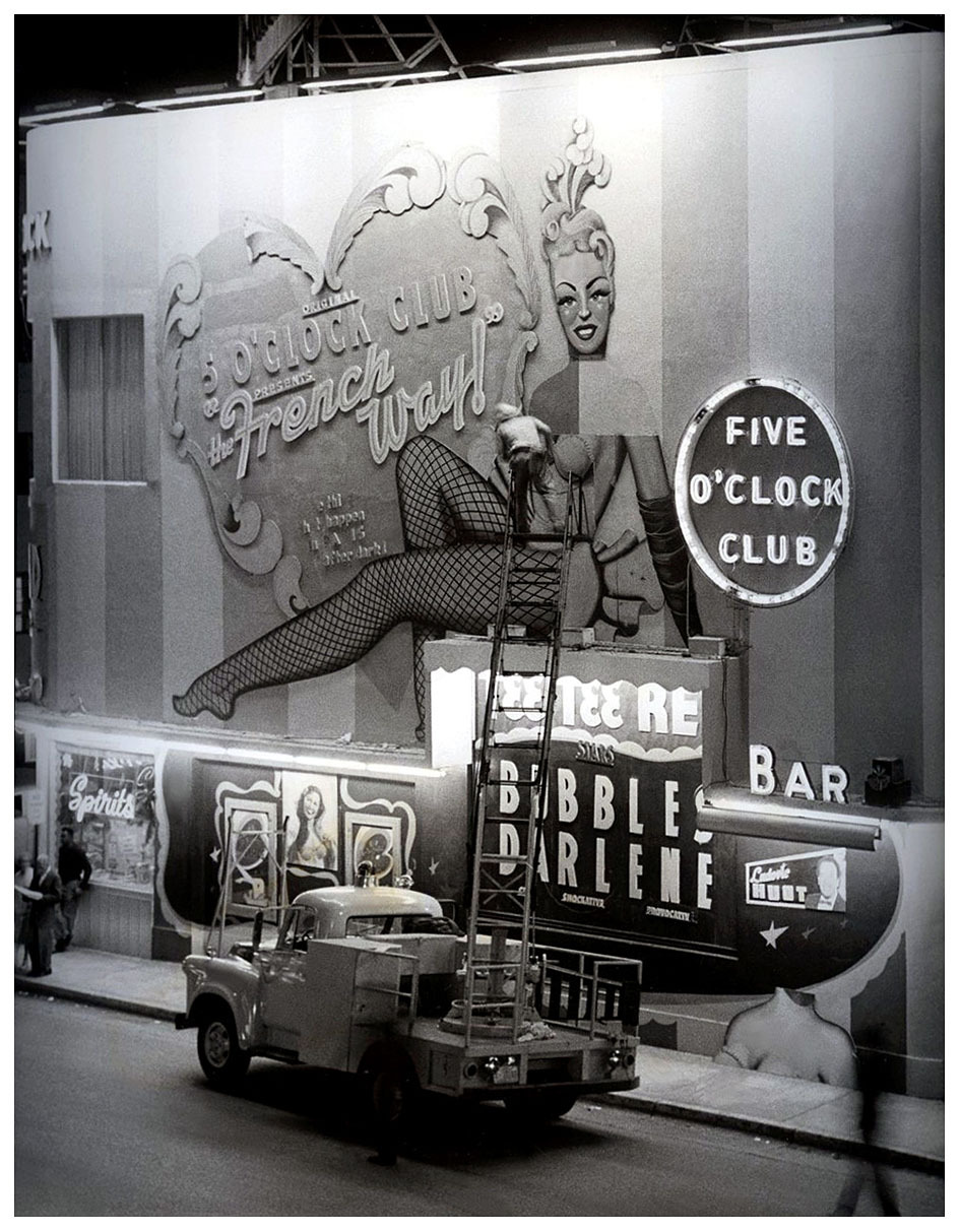 In a press photo dated from the mid-1950′s, a worker can be seen making repairs