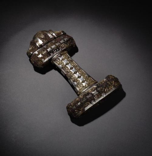 armthearmour:A stunning Viking era sword hilt of bronze inlaid with silver, Eigg, Scotland, ca. 9th 