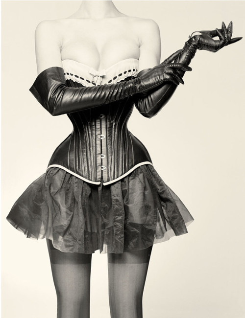 jadevixen: One of my iconic fetish fashion images from the “Secret Desires” series by Karl Doyle. 17" tightlaced 1907 corset by Lovesick Corrective Apparel.  cg54kck:  “Corset and Hand” by Karl Doyle 2006  