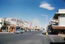vintagelasvegas: Fremont Street at 3rd, Las Vegas, c. 1952 Playing at Fremont Theatre might be Walk East on Beacon (1952). Microcar parked in front of Melodie Lane. Photo found at Vegas Valley. 