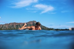 cheynekalai:  Sometimes, in between sets, I’ll dive below the line-up and watch the rays of light that flare past the silhouettes of surfers as they hang over the rails of their boards. It’s like watching a slow motion surf film. Except they’re