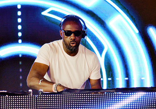 celebritiesofcolor:  Idris Elba performs live on the Sonic stage during the second day of Glastonbury Festival at Worthy Farm, Pilton on June 27, 2015 in Glastonbury, England.