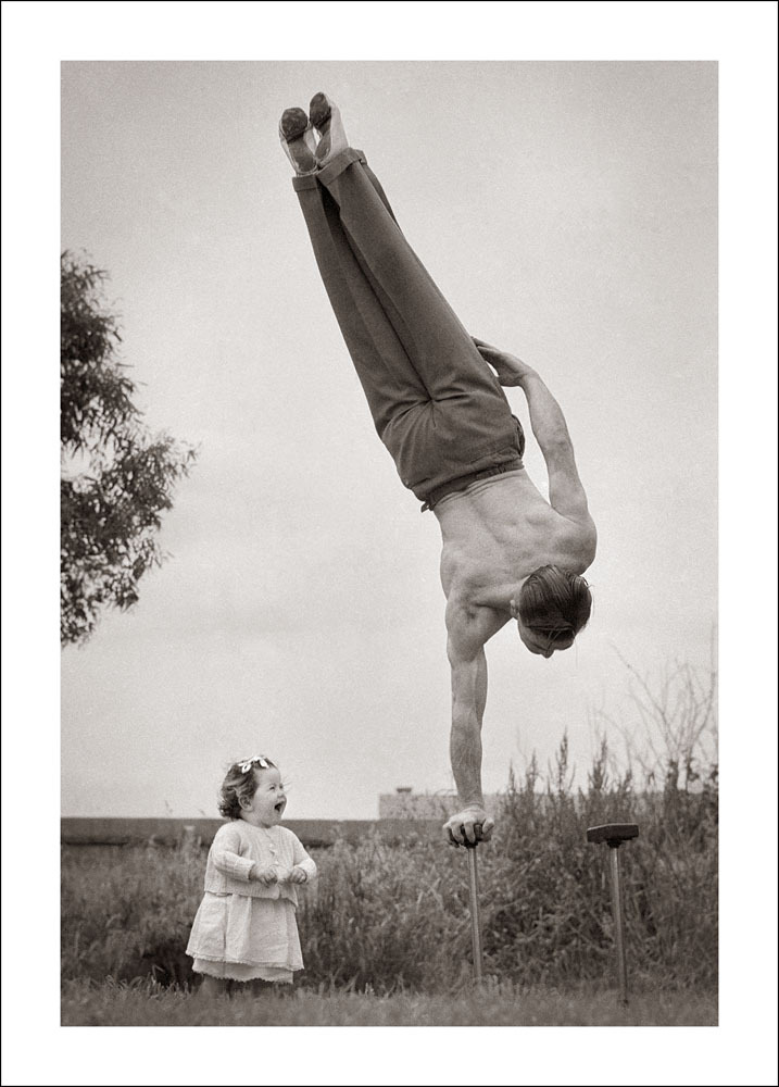 vintageeveryday:    Dad showing off his skill to the surprise of her little daughter