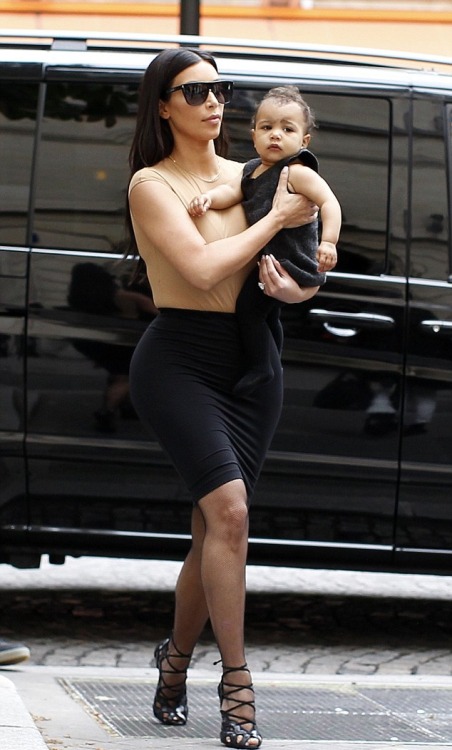 kimkanyekimye:  Kim and North heading into the Givenchy store in Paris 5/20/14