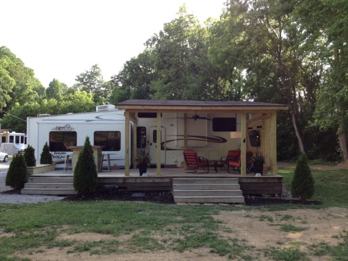 craftycub:  I’ve been helping Mike add on to his deck at the camper. The Deck was already there, but the two of us added the roof, and television wall, built the fire pit table and planter. Can’t wait to use it! :)