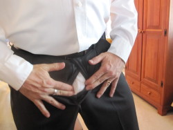 bidad91:  Getting ready for church is morning.  Nice clean, tight cotton Gs always feel great.  Always wanting to poke out a little from my suit pants fly.  Such a great view, I really like my big cockhead breaking out.  More posts soon on the escape