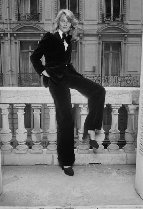 Charlotte Rampling wearing Yves Saint Laurent’s “Le Smoking” tuxedo suit, photographed by Helmut New