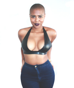 18-15n-77-30w:  foxxxynegrodamus:  me looking properly adorable in the Black Latex Bralette from my lil ratchet mini clothing line.  so bad