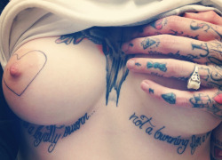 petitebisexual:  So much perfection in this picture right here! The tattoos, the boobs, the nipple… and the ring. asdfghfdsa