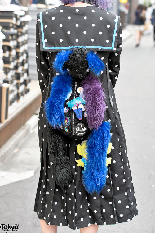 Sakanako on the street in Harajuku with purple hair, a Candy Stripper sailor collar polka dot dress,