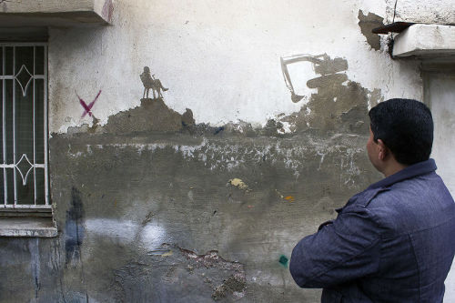 art-tension:Peeling Off Old Paint To Tell Stories Of Palestinian Refugees by street artist Pejac Wit