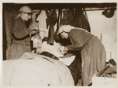 scrapironflotilla: Mairi Chisholm and Elsie Knocker tend to a wounded Belgian soldier in their advan