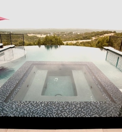 Infinity AustinLarge Trendy Backyard Concrete Paver And Custom-shaped Infinity Pool Fountain Photo