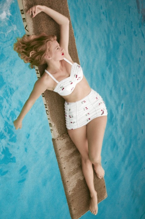 gatabella: Anita Ekberg  by Milton H. Greene in cherry print swimsuit on diving board. Swimsuit