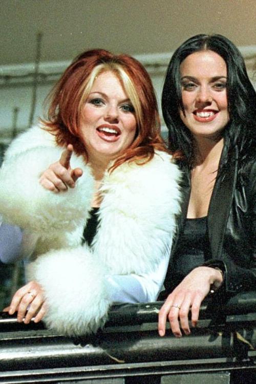 Geri Halliwell (Ginger Spice) and Melanie C (Sporty Spice)- Spice Girls