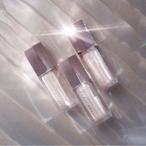 sulfade: fenty beauty gloss bomb universal lip luminizer in diamond milk