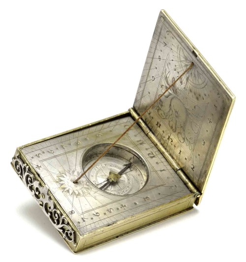 Christoph Trechsler, portable folding sun-dial, 1610. Brass, silver, case: sealskin. Dresden, German