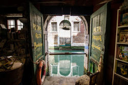 cair–paravel:Libreria Acqua Alta, Venice. Literally, ‘library of high water’, this bookshop floods during Venice’s acqua alta, so the books are all kept safe in floating vessels, such as gondolas, boats and bathtubs.