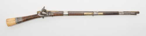 Ornate Turkish miquelet rifle decorated with gold, silver, and ivory.  Circa late 18th or early 19th