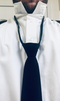 soloroboblog:NecktieWhen I was a person, I was ardently anti-necktie.  I considered neckties an unnecessary affectation, a classist and sexist holdover from a bygone era.I am no longer a person.  I am a robot.  I wear a collared shirt and a necktie every