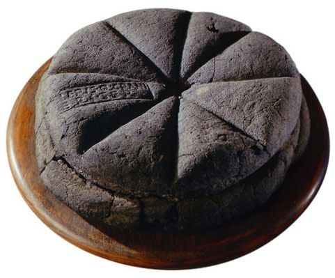 Preserved loaf of Bread from Pompeii complete with the maker’s stamp.