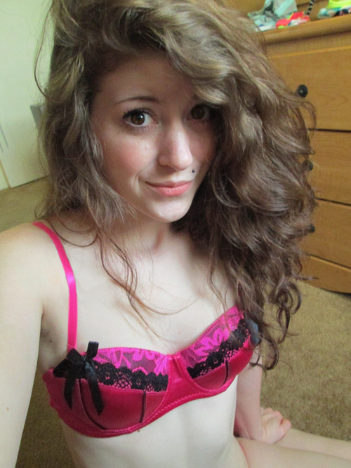 Young teen girl wearing bra