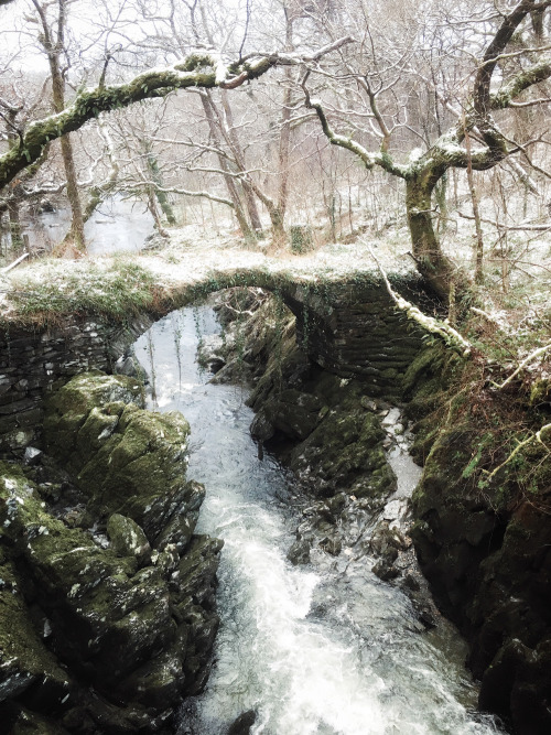 juliancalverley: From March of this year.. A dusting of snow on the packhorse bridge, River Machno, 