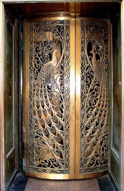 sexual-brit:  kenzotrufi:    Absolutely jawdroppingly beautiful bronze work. Door to the former C.D. Peacock jewelry store on State Street at Monroe in Downtown Chicago, Illinois.    @bubbly-jewelz @makesmymouthwaternsfw 