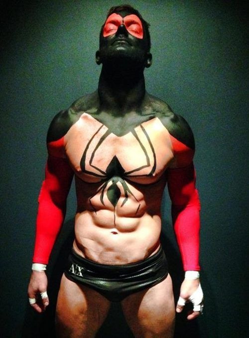 paintedguys:  One damn fine looking wrestler. The body paint is so hot! I just want to grapple him. 