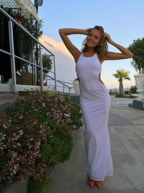 Katya in tight white dress