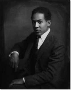vintageblackglamour:  Langston Hughes was born 112 years ago today in Joplin, Missouri. This photo was taken by Nickolas Muray, a Hungarian-American photographer who was also an Olympic fencer, in 1923 when Mr. Hughes was about 21 years old.