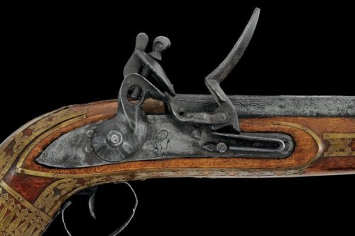 Flintlock blunderbuss with brass mounted jezail stock, Afghanistan, 19th century.