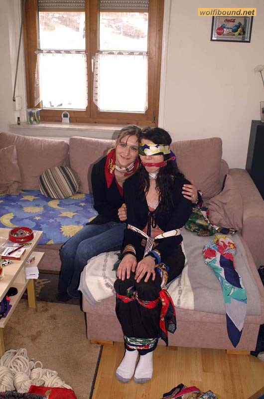 graybandanna:  Tying up her friend before joining her in scarf bondage